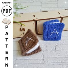 two crocheted items sitting next to each other