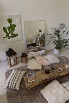 a living room filled with furniture and mirrors