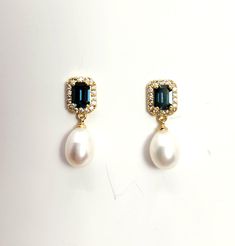 6mm white or cream swarovski round pearl drop with emerald rectangle cut Montana navy blue crystal rhinestone gold or rhodium silver plated post earrings. Size: 1.4cm x 7cm Returns and exchange details   Customer Satisfaction Guarantee: Below policy will replace standard ETSY policy- please read carefully before purchasing. If you are not satisfied with an item for any reason, I will provide a full refund less the actual shipping and handling charge (usually around $4.00). The return or exchange request must be made within 3  days from the actual delivery date. All returns must be postmarked within 3 business days of receiving a return authorization. Please contact me via Etsy convo only. I do not accept return/exchange authorization requests after 3 days from receipt of shipment and do no Navy Blue And Pearl Wedding, Exquisite Pearl Drop Jewelry, Exquisite Oval Pearl Drop Jewelry, Elegant Rectangular May Birthstone Earrings, Elegant Rectangular Emerald Earrings For May Birthstone, Elegant Rectangular Pearl Drop Earrings, Fine Jewelry Oval Pearl Drop, Elegant Blue Emerald-cut Jewelry, Elegant Drop Jewelry With May Birthstone