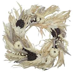 a white wreath with black and white decorations