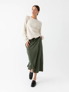 Comfort meets class in our first women’s skirt made from the same softness of our Women’s Ultra-Soft Jogger. Featuring two knee-length slits to offer free-flowing, feminine flair and a dreamy brushed finish, this season-less midi skirt offers endless styling options to look effortlessly elegant in less time. A drawstring stretch waist enhances comfort while patch pockets give your essentials a place to stay. DETAILS: Ultra soft brushed fabric 62% Premium Viscose from Bamboo, 28% Acrylic, 10% Spa Soft Joggers, Best Pajamas, Free Flowing, Back Women, Mens Joggers, New Tops, Bottom Clothes, Hoodie Top, Travel Outfit