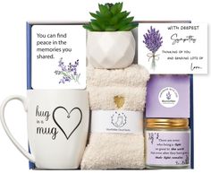 the lavender gift box includes two mugs, three towels and a potted plant