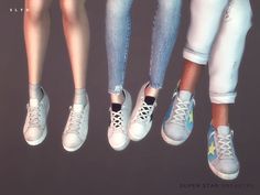 four pairs of sneakers with different colors and sizes