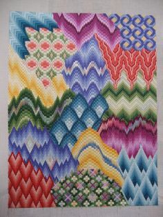 a cross stitch pattern with many different colors