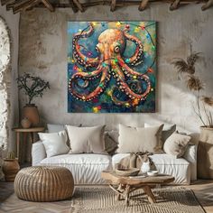 an octopus painting hanging on the wall in a living room