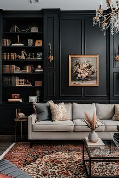 a living room filled with furniture and a chandelier