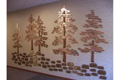 the wall is decorated with many different types of trees