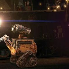 a robot with a flashlight in its hand