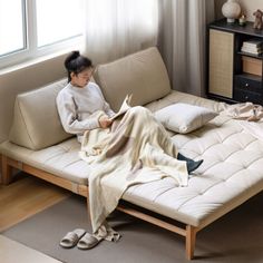 A sofa bed that is very worthy of being used as a sofa or a bed! Put the backrest bag on, and the sitting depth can reach 66cm The seating area is nearly 21% larger than that of an ordinary sofa. The sitting position can be changed more freely. The inner diameter of the bed is 198*188cm. Two people can sleep together without feeling cramped. I absolutely love the small apartment! Minimalist Small Apartment, Wood Sofa Bed, Walnut Sofa, Sleeping Together, Rice White, Grey Sofa Bed, Modern Sofa Bed, Walnut Side Tables, Small Apartment Living Room