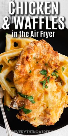 chicken and waffles in the air fryer on a plate with a fork