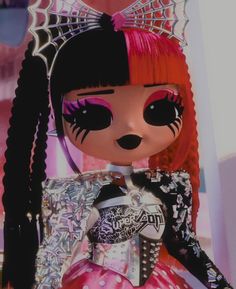 a doll with red hair and black eyes wearing a pink dress is standing in front of a mirror