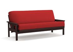 a red couch sitting on top of a wooden frame