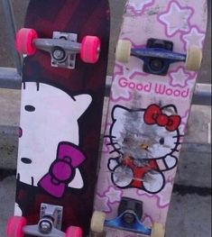 two skateboards with hello kitty designs on them