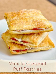 three puff pastries stacked on top of each other with the words vanilla caramel