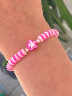 Cute pink clay bead bracelet with pink and white star Trendy Pink Jewelry With Star Charm, Handmade Pink Star-shaped Jewelry, Trendy Pink Star-shaped Jewelry, Pink Star-shaped Beaded Bracelets, Trendy Pink Star Bracelet, Cute Pink Jewelry With Star Charm, Pink Star-shaped Jewelry With Colorful Beads, Adjustable Pink Star Bracelets, Pink Beaded Polymer Clay Jewelry