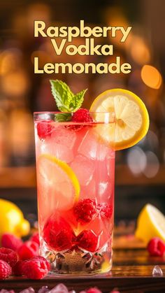 raspberry vodka lemonade in a tall glass with ice and garnish