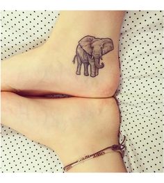 two people with tattoos on their feet and one has an elephant tattoo