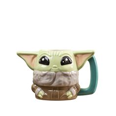 the child yoda mug is green and has black eyes