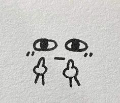 a drawing of two faces with one eye open and the other half drawn in black ink