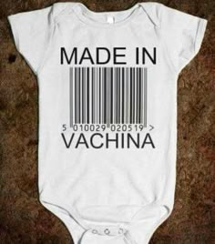 a baby bodysuit with the word made in vachina printed on it's chest