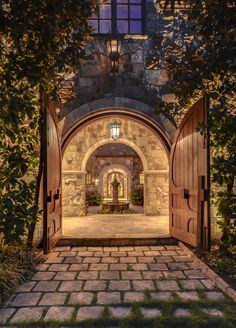 an open door leading into a stone building