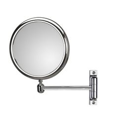 a round mirror mounted to the side of a metal wall mount hook on a white background