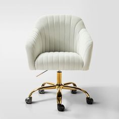 a white office chair with gold wheels and casteors