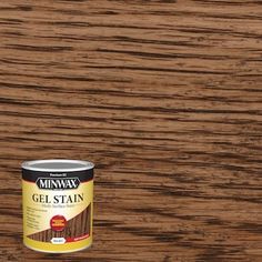 a can of minwax gel stain sitting on top of a wooden table