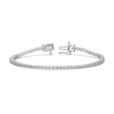 This beautifully simple and elegant tennis bracelet shimmers as you move. Set with a single row of brilliant cut diamonds within elegant three-prong baskets for a minimal metal appearance. Gorgeous Engagement Ring, Diamond Tennis Bracelet, Elegant Bracelet, Tennis Bracelet Diamond, Halo Engagement Ring, Tennis Bracelet, Conflict Free Diamonds, Lab Diamonds, Diamond Earrings Studs