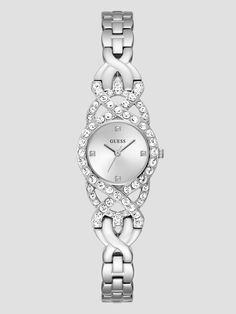 Silver-tone analog watch Crystal bezel Minimal hour markers Polished stainless steel bracelet Case diameter in mm: 23 Water resistant up to 10M/33 ft Two-year limited warranty Silver Watch Women, Guess Watches, Watches Silver, Silver Watches Women, Guess Watch, Flower Watch, Crystal Watches, Analog Watch, Wedding Watch