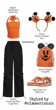 an orange top and black pants with mickey mouse ears on the side, including headbands