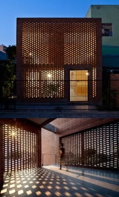 two images show the inside and outside of a building with wooden slats on it