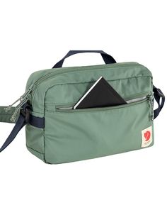 FJALLRAVEN High Coast Crossbody Bag - BLUE | Tillys Functional Travel Accessories With Adjustable Strap, Functional Travel Accessories With Adjustable Strap For Trips, Functional Crossbody Travel Bag With Adjustable Strap, Practical Chest Bag With Removable Pouch For Travel, Green Bags With Functional Pockets For Travel, Green Bags With Functional Pockets For Trips, Functional Travel Accessories Shoulder Bag With Removable Pouch, Functional Chest Bag With Adjustable Strap For Travel, Functional Travel Shoulder Bag With Removable Pouch