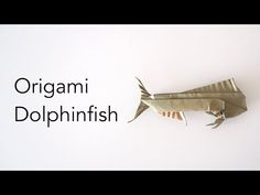 an origami dolphinfish made out of folded paper on a white background with the words, origami dolphinfish