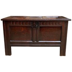 an old wooden chest with two doors