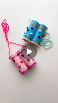 an origami craft project with paper and thread