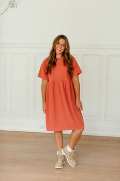 Feel comfortable without sacrificing style in this modest length midi dress that is perfect for the late summer season! The unique textured knit fabric makes the 'Reese' standout, while still maintaining the classic t-shirt dress style. Layer with a sweater for a cozy look, or add a denim jacket for an elevated chic! 93% Polyester, 7% Spandex Unlined Hand Wash Cold Separate Hang or Lay Flat to Dry Do Not Bleach Low Iron If Needed Maternity/Bump Friendly! FINAL SALE: NOT ELIGIBLE FOR RETURN OR EX Spring Ribbed Midi Dress For Daywear, Spring Loungewear Solid Color Dresses, Casual Textured Knit Summer Dress, Casual Crew Neck Midi Dress, Modest Short Sleeve Solid Color Dress, Solid Color Short Sleeve Relaxed Fit Midi Dress, Solid Color Relaxed Fit Midi Dress, Relaxed Fit Midi Dress With Short Sleeves, Casual Crew Neck Midi Dress For Fall