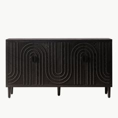 an art deco sideboard with wavy lines on the front and sides, in black wood