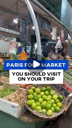 an open market with lots of fruits and vegetables on display in front of the words paris for market you should visit on your trip