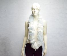 Make your stylish more luxury and warm, With this fluffy fur scarf, is made from cropped of Fox fur white blue pieces, it's very warm fluffy and soft accessory to keep you warm in winter time. Measures Length: ~120cm/47 inches Width: ~10cm/4 inches For wholesale please contact All garments and accessories are unique, handmade under the copyright of Mink Glamour Fur. We Use only new genuine materials nothing reused or recycled.  Please inform me at checkout if you prefer to have a different shipp Fox Fur Scarf, Fur Scarf, Winter Time, Fox Fur, White Pearl, Pearl White, Scarf Wrap, White Blue, Scarf Accessory