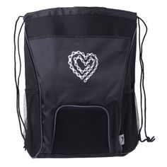 a black backpack with a white heart on it