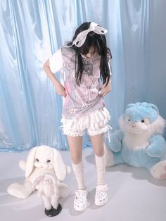 The price is for a T-shirt only, others are not included.  Daytoday and Milkyhearts Collaboration.  Garment Size   	 		 			Size 			S 			L 		 		 			Full Length 			65 			75 		 		 			Bust 			94 			114 		 		 			Shoulders 			42 			51 		 		 			Sleeve Length 			18 			21 Harajuku Tops With Ruffles, Harajuku Style Ruffled Tops, Cute Pink Ruffled T-shirt, White Ruffled Kawaii Top, White Ruffled Short Sleeve T-shirt, White Ruffled Crew Neck T-shirt, Cute Crew Neck T-shirt With Ruffles, Playful Ruffled T-shirt For Summer, Cute Pink T-shirt With Ruffles