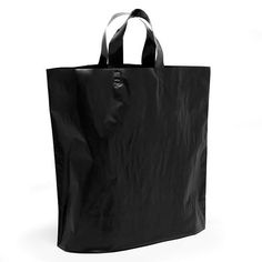 a black shopping bag on a white background with clippings to the side and bottom