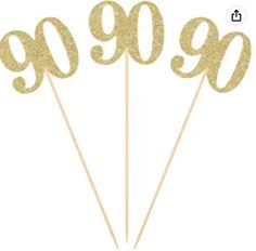 gold glitter 90th birthday cake toppers with the number 90 on it's stick