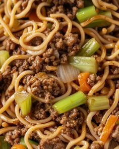 noodles with ground beef and vegetables on a plate