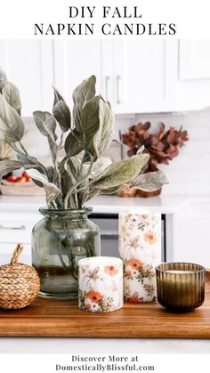 diy fall napkin candles on a kitchen counter with flowers and leaves in a vase