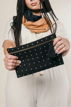 The Essentials. Our Cross-Stitch Pouch Clutch is perfect for carrying your must-haves. Use this zippered pouch as a clutch during a night out or as a sleeve to transport your laptop to and from work. #anchalproject #fairtrade #designingchange #artisanmade #ethicaldesign #sustainableliving #modernhome #sustainabletravelgoods Travel Clutch, Oversized Clutch, Large Pouch, White Crosses, Zippered Pouch