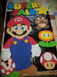 an image of a super mario poster on the ground with other characters around it and text that reads, super mario