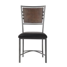 a wooden and metal dining chair with black leather upholstered seat, viewed from the front