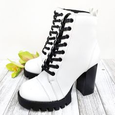 Look Stylish In These Newly Arrived White Block Heel Combat Boots New In Box Man Made Leatherette Material Black Lace And Heel Lightly Padded Insole Side Zipper For Easy Shoe Removal Lug Sole Block Heels Heel Height: 4 In. Fitting: True To Size White Heel Boots, Heel Combat Boots, White Block Heels, Black And White Heels, White Boots, Look Stylish, Lug Sole, Dr. Martens Boots, Wedge Sneaker